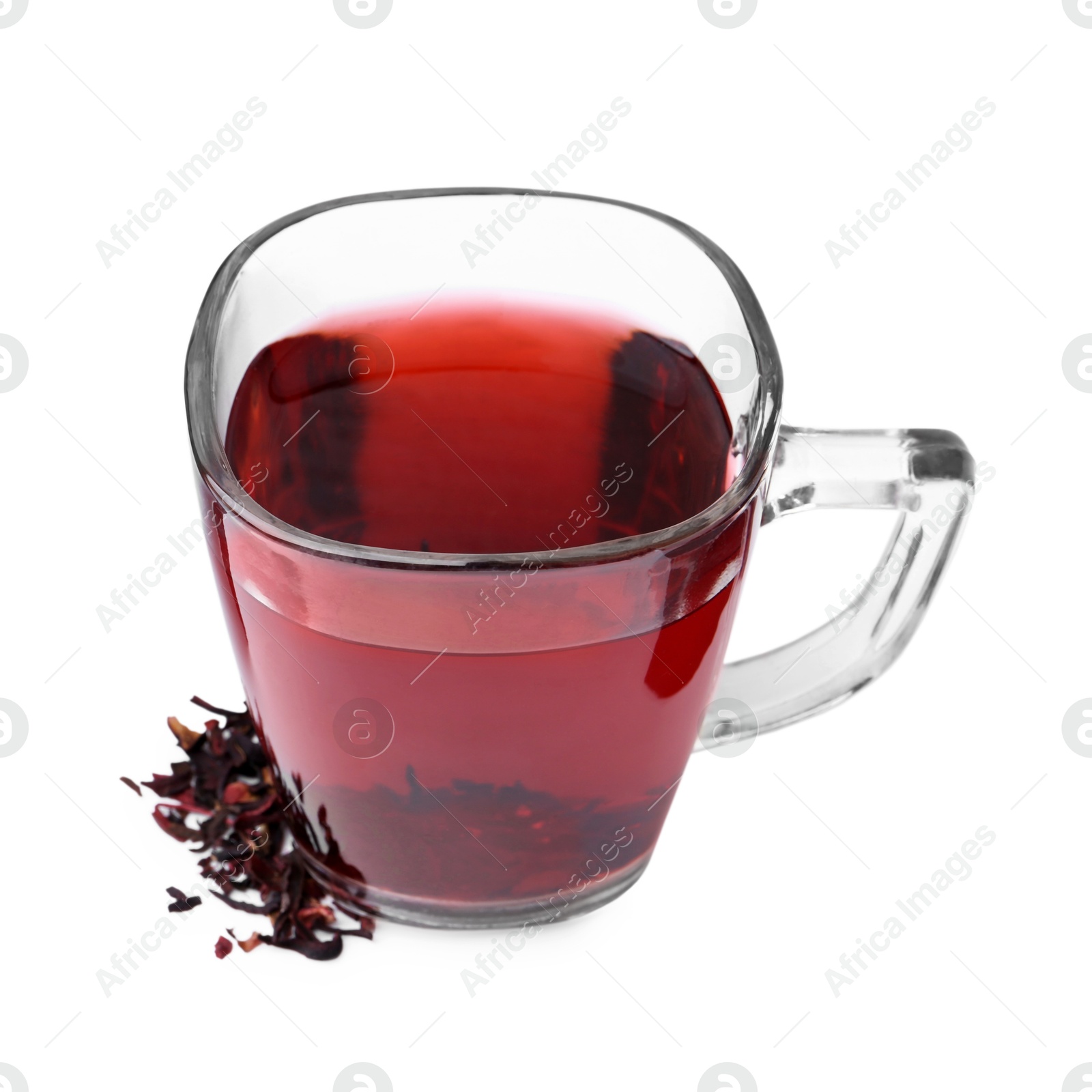 Photo of Delicious hibiscus tea in glass cup and dry roselle sepals isolated on white