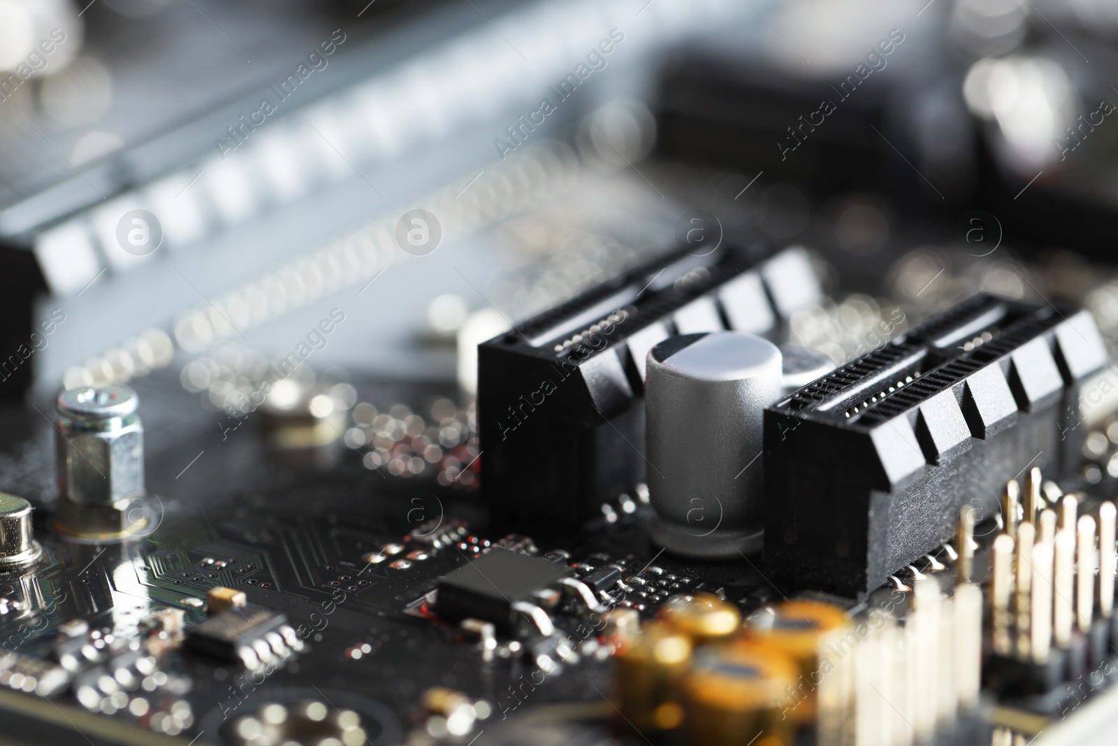 Photo of Computer motherboard as background, closeup. Electronic engineering