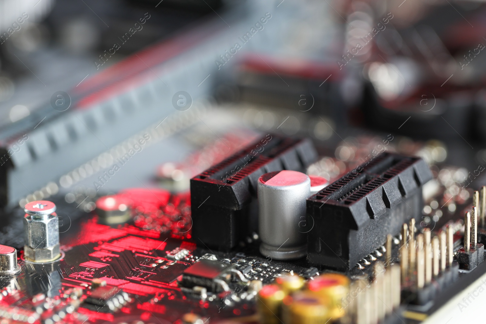 Photo of Computer motherboard as background, closeup. Electronic engineering