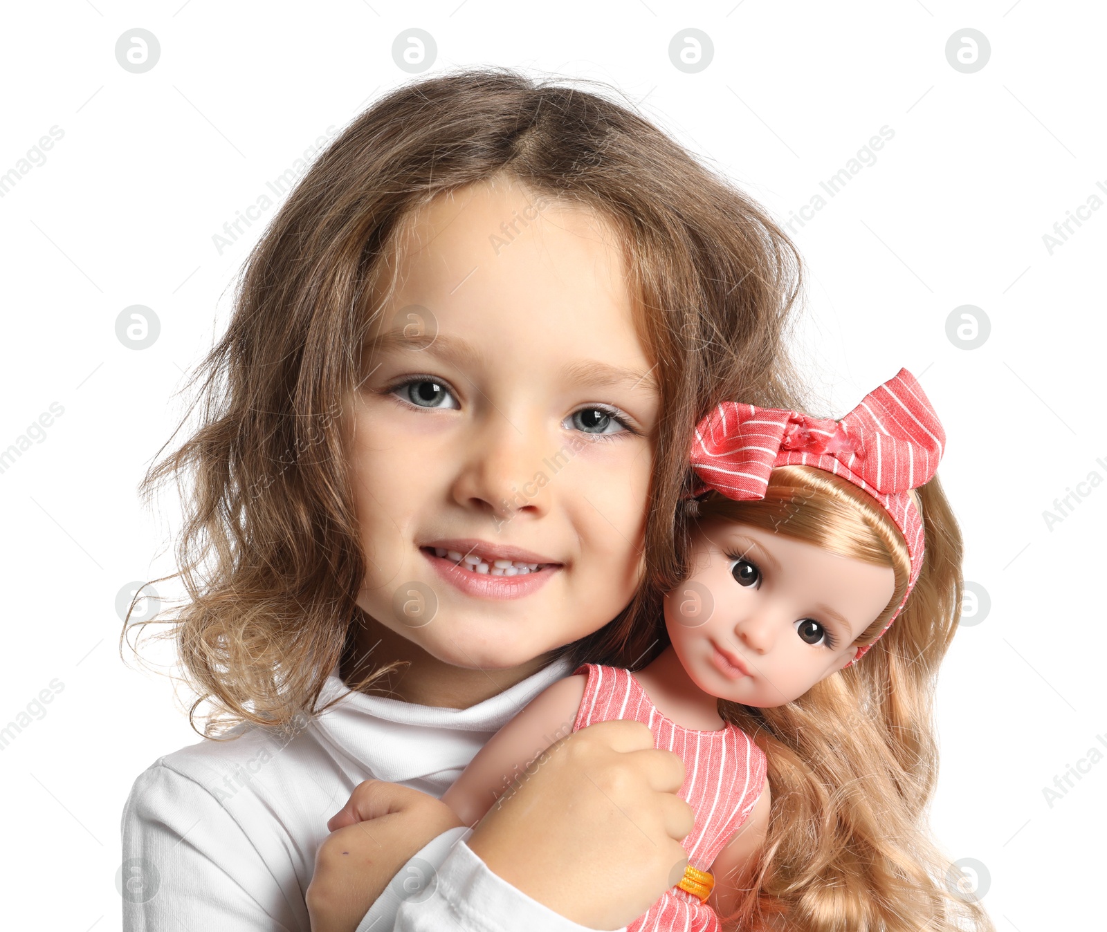 Photo of Cute little girl with doll on white background