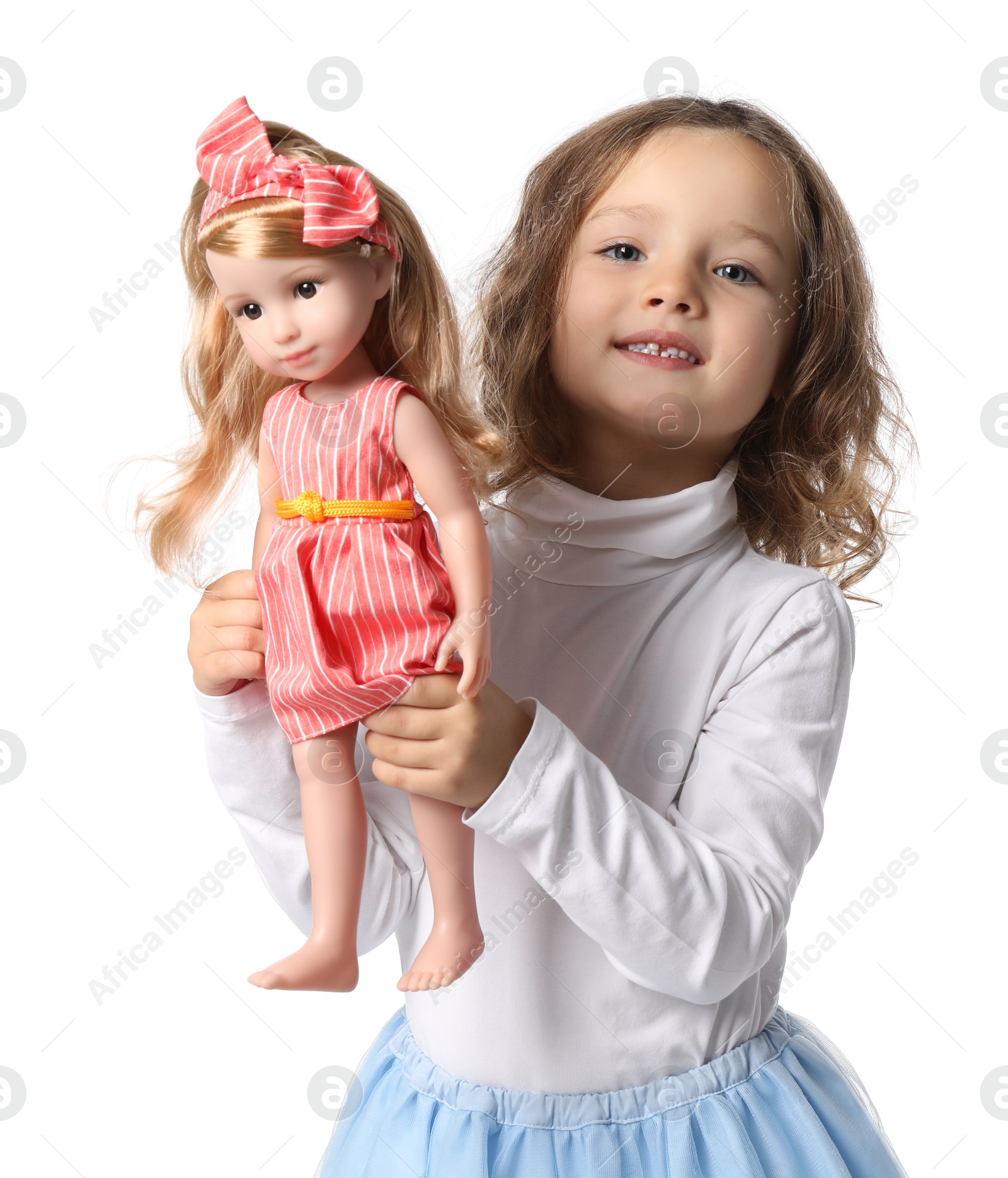 Photo of Cute little girl with doll on white background