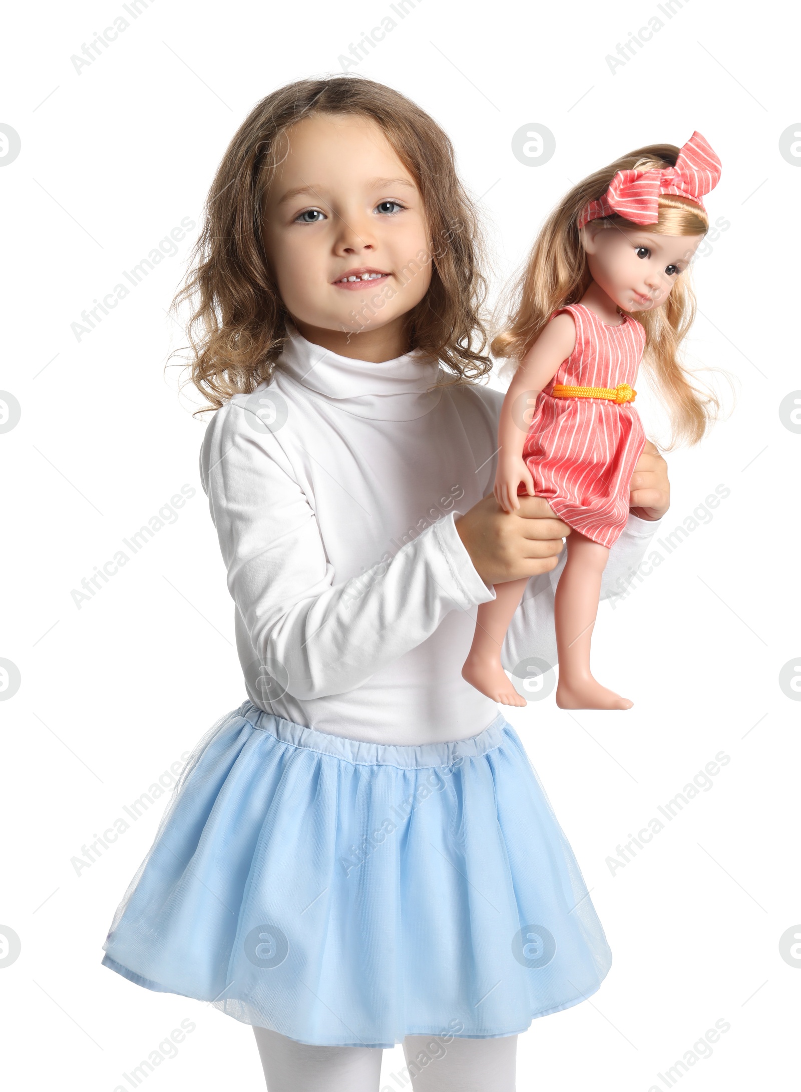 Photo of Cute little girl with doll on white background