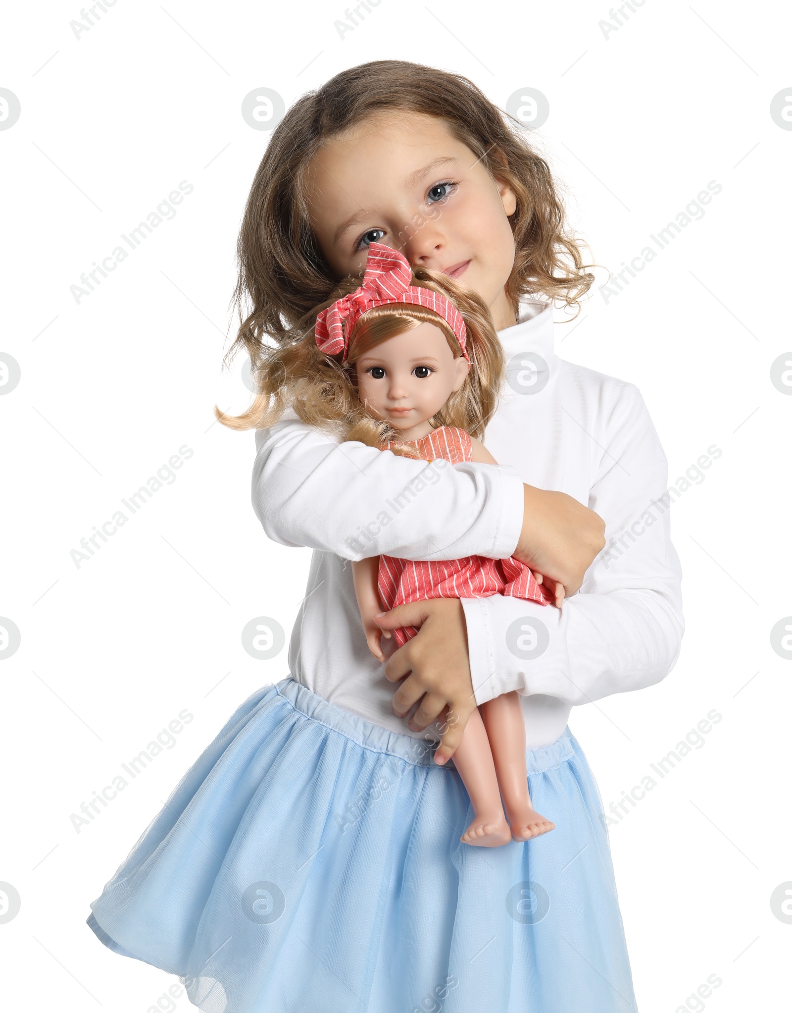 Photo of Cute little girl with doll on white background