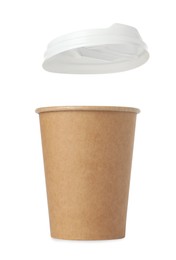 Photo of Paper cup with lid on white background. Mockup for design