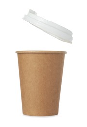 Photo of Paper cup with lid on white background. Mockup for design