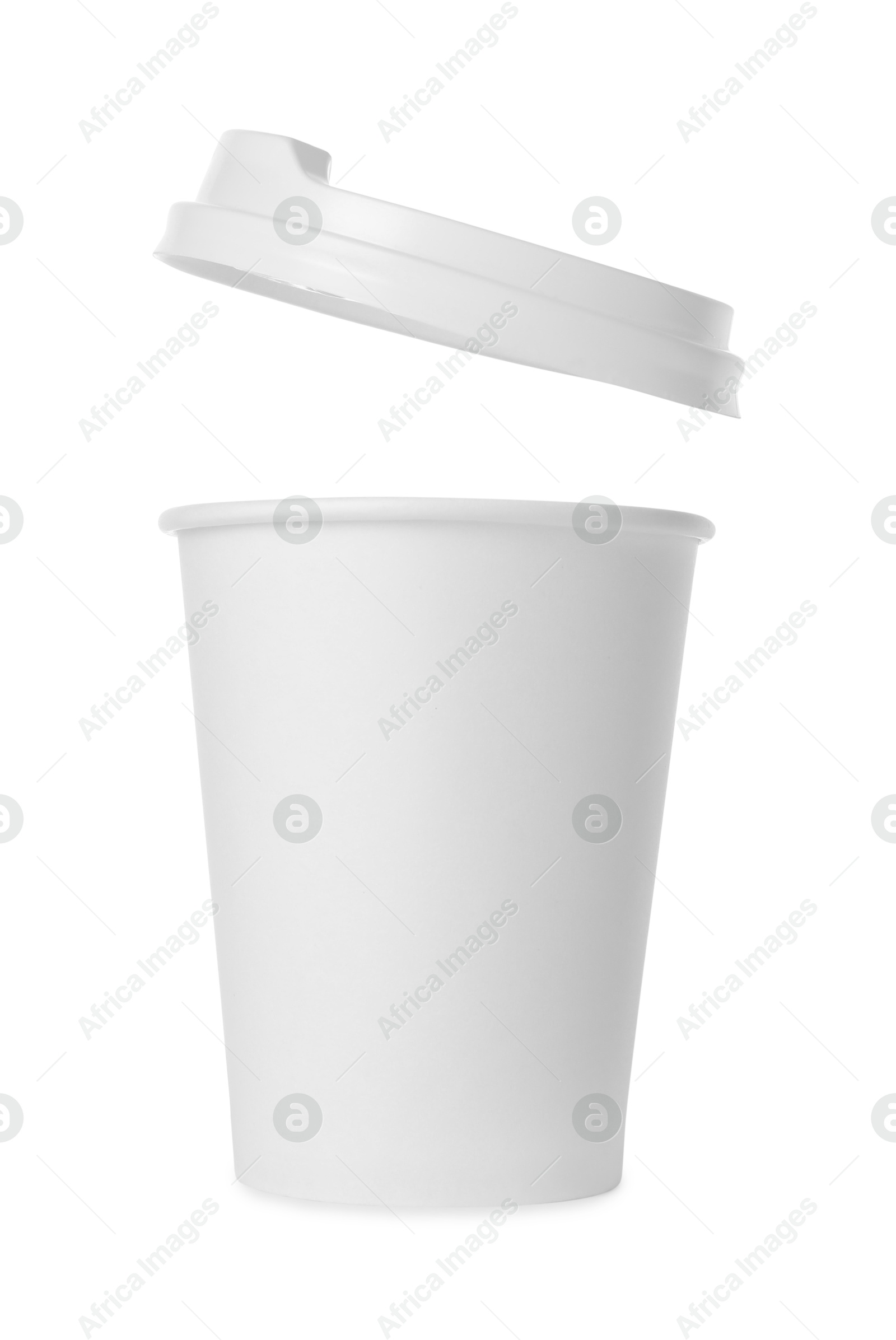 Photo of Paper cup with lid on white background. Mockup for design