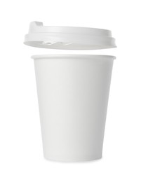 Photo of Paper cup with lid on white background. Mockup for design