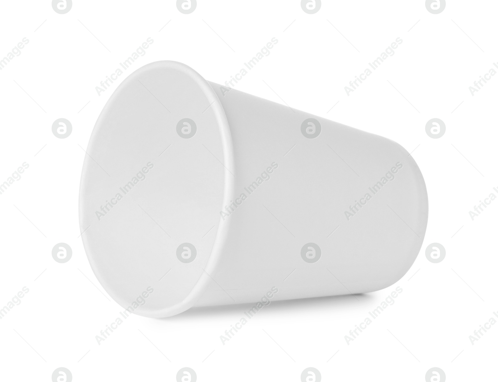 Photo of One paper cup on white background. Mockup for design