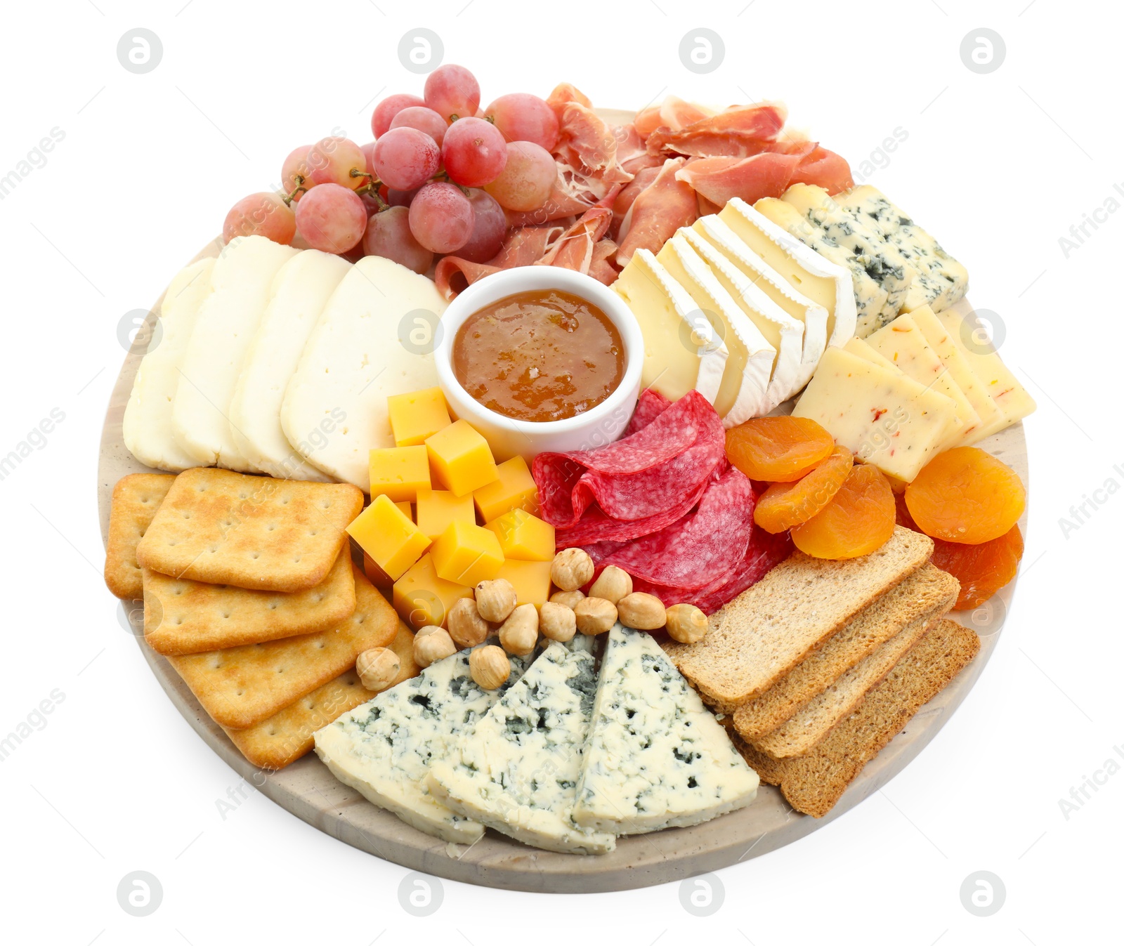 Photo of Different types of cut cheese and other snacks isolated on white