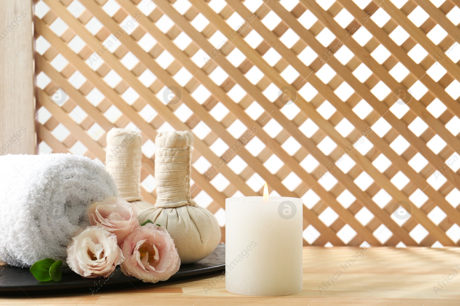 Photo of Composition with cosmetic products for spa treatment on wooden table, space for text