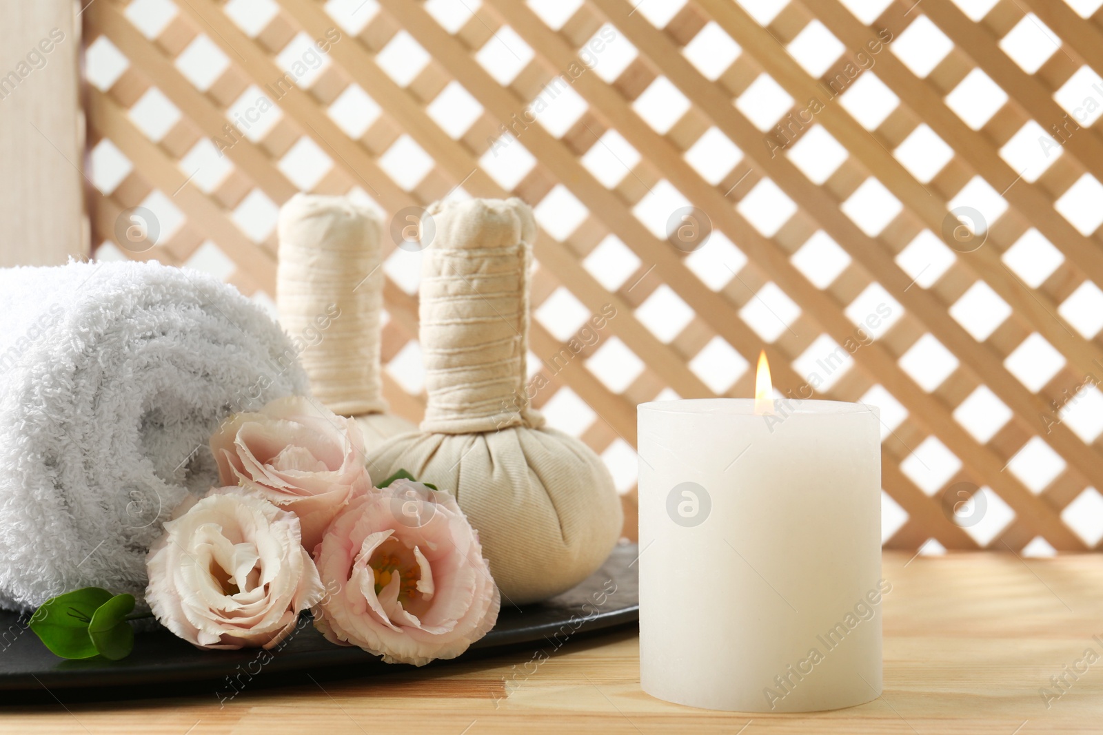 Photo of Composition with cosmetic products for spa treatment on wooden table