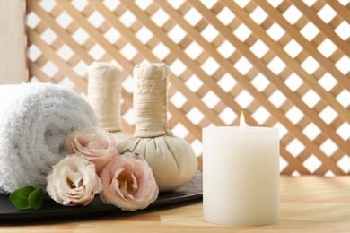 Photo of Composition with cosmetic products for spa treatment on wooden table