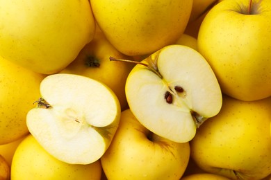 Photo of Fresh ripe yellow apples as background, closeup