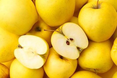 Photo of Fresh ripe yellow apples as background, closeup