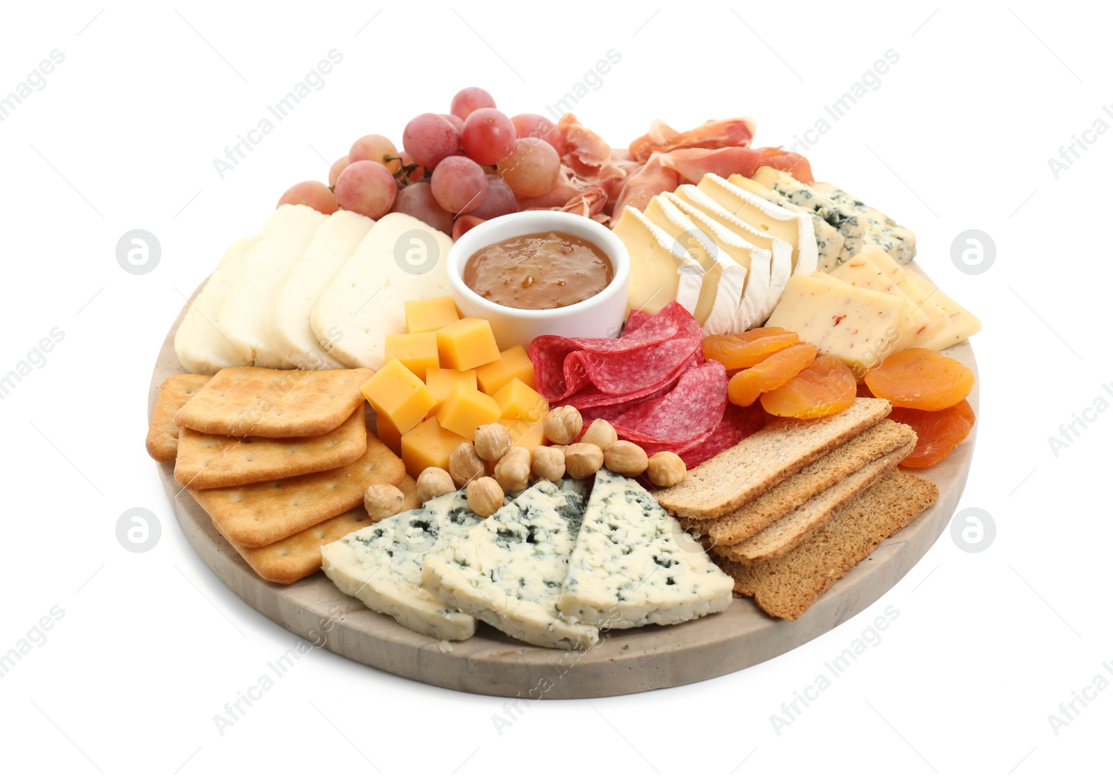 Photo of Different types of cut cheese and other snacks isolated on white