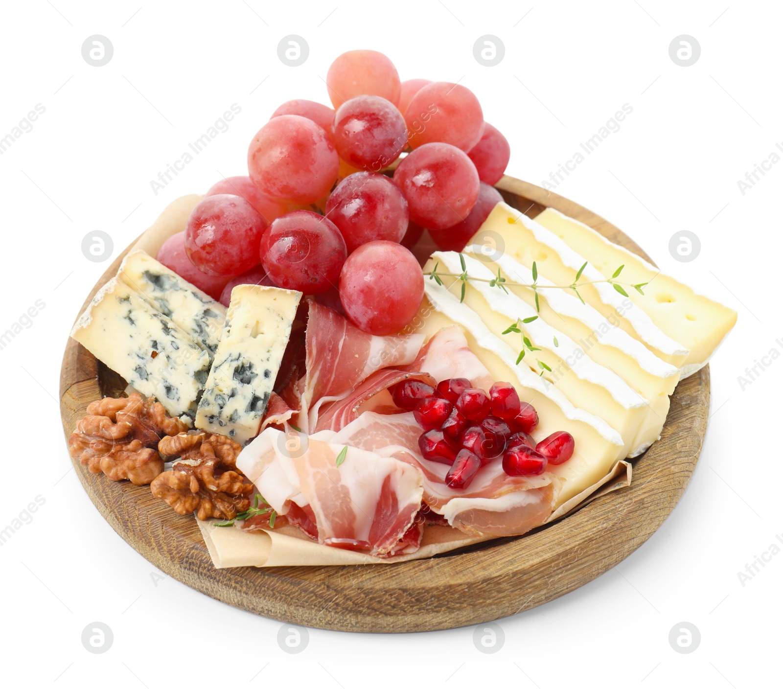 Photo of Different types of cut cheese and other snacks isolated on white