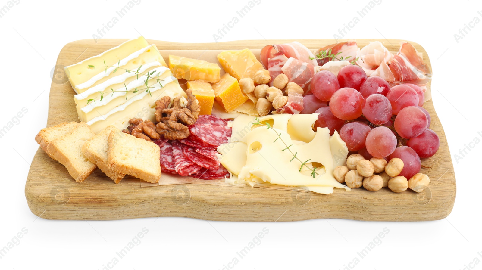 Photo of Different types of cut cheese and other snacks isolated on white