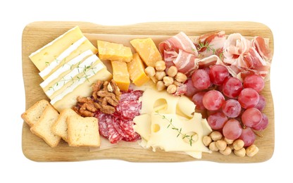 Photo of Different types of cut cheese and other snacks isolated on white, top view