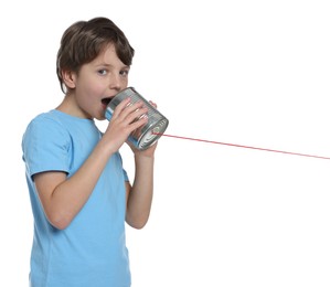 Photo of Boy using tin can telephone on white background