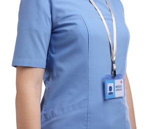 Photo of Medical assistant with badge on white background, closeup