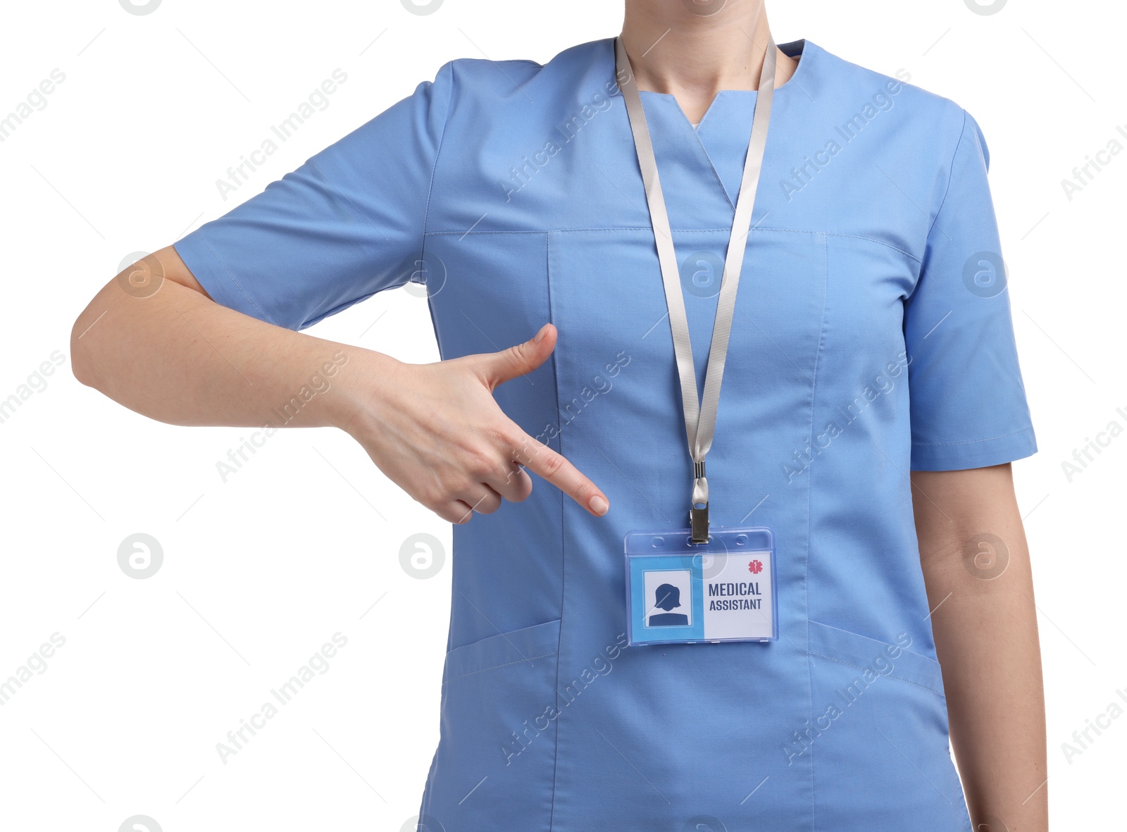 Photo of Medical assistant pointing at her badge on white background, closeup