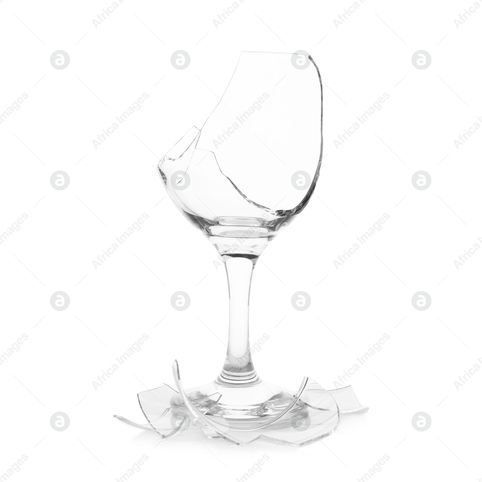 Photo of Pieces of broken wine glass isolated on white