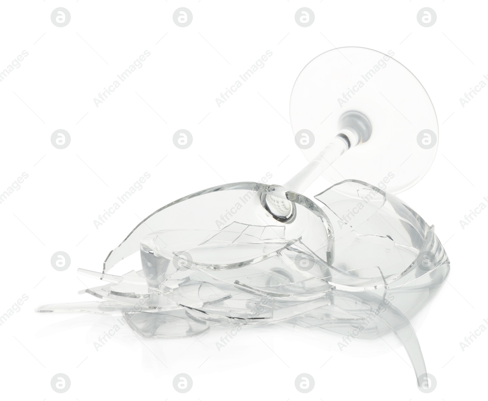 Photo of Pieces of broken wine glass isolated on white