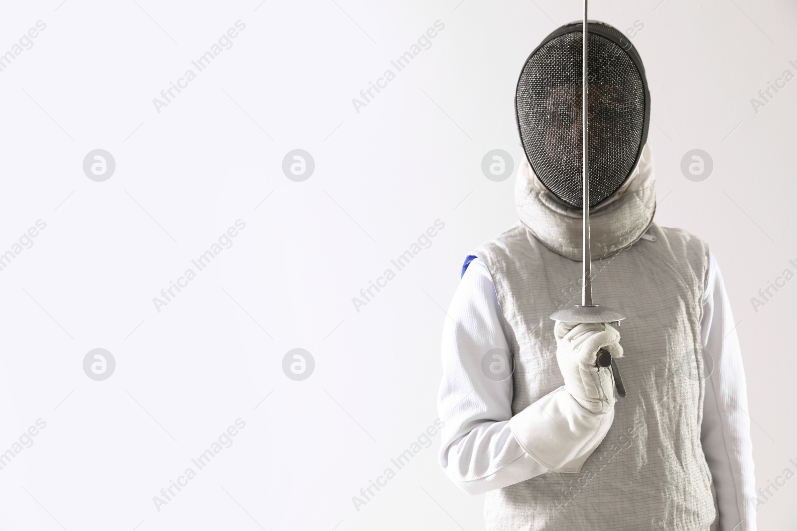 Photo of Fencer with epee on white background, space for text