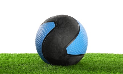 Photo of Ball on artificial grass isolated on white. Sport equipment