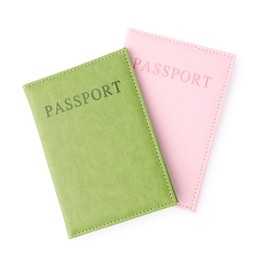 Photo of Passports in bright covers isolated on white, top view