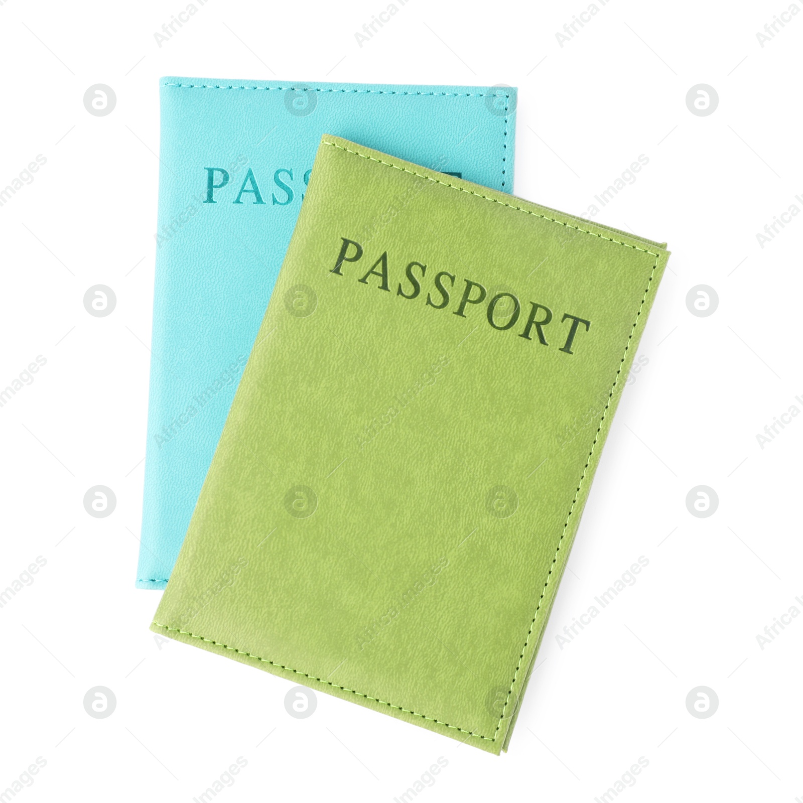 Photo of Passports in bright covers isolated on white, top view