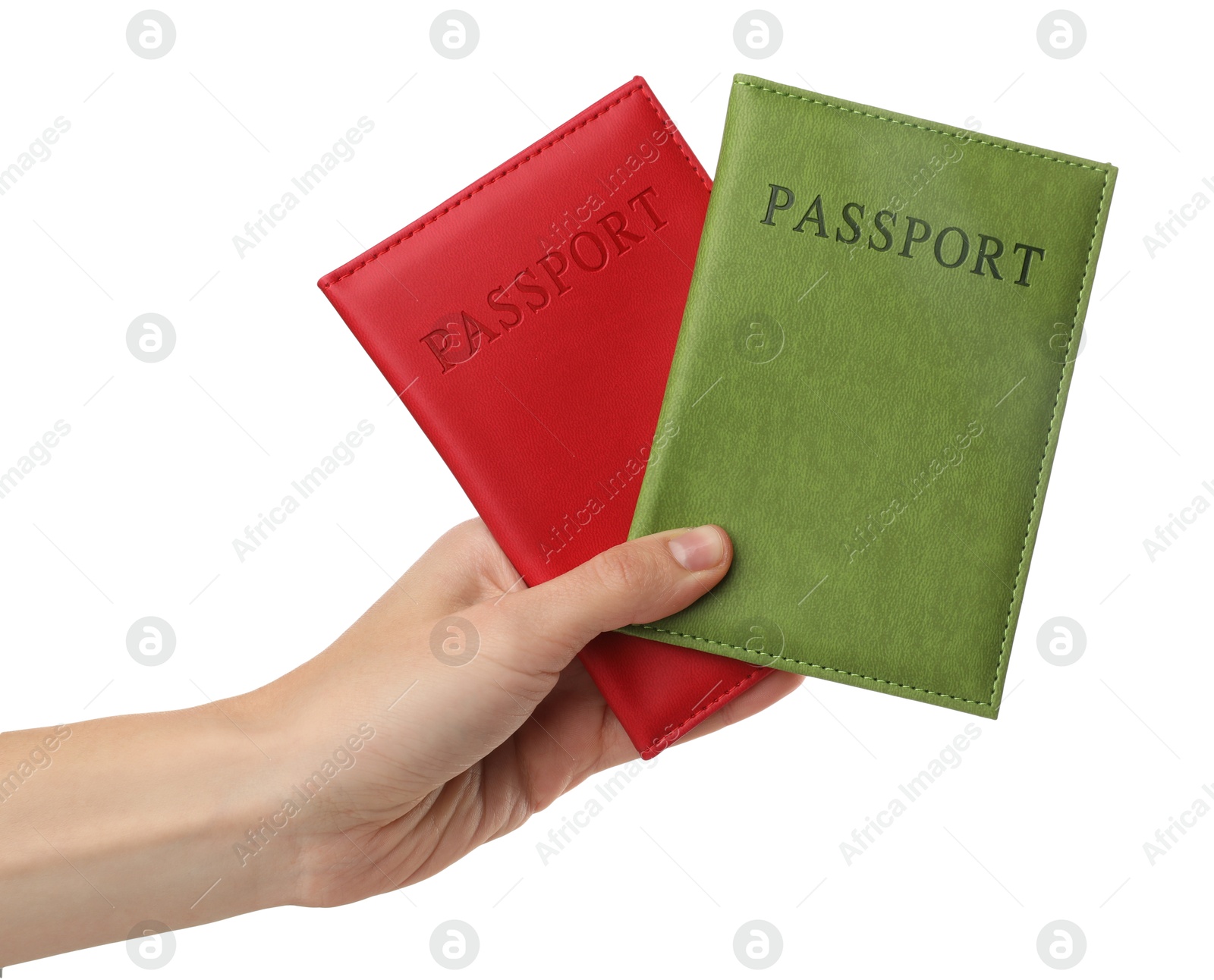 Photo of Woman holding passports in bright covers on white background, closeup