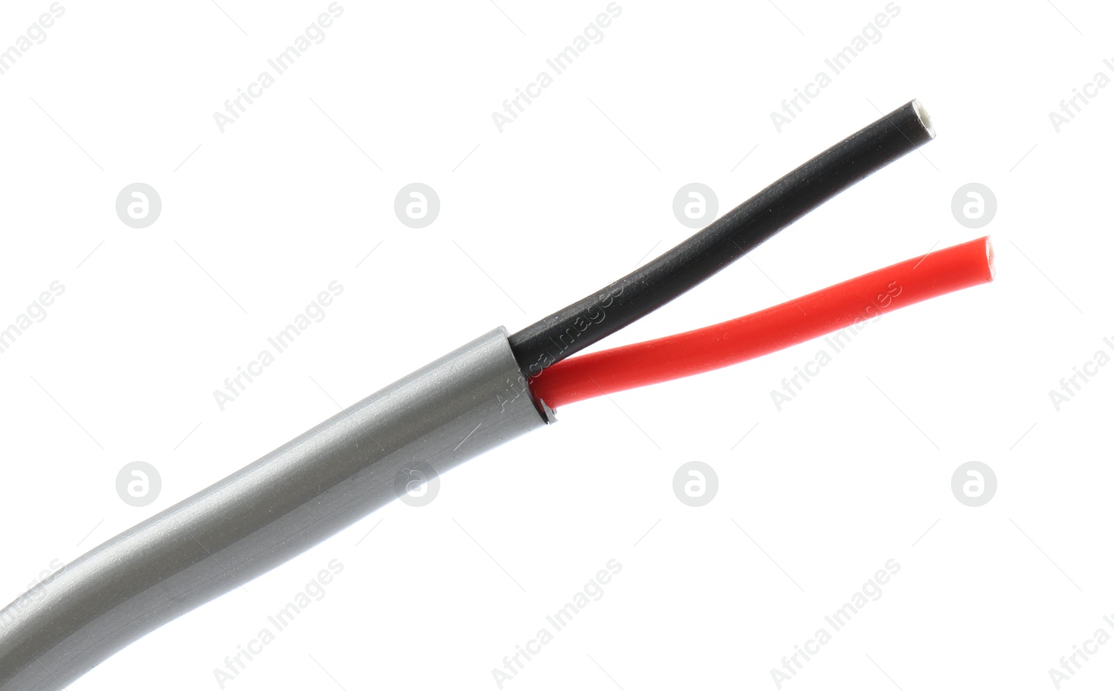 Photo of Grey stripped electrical wire on white background