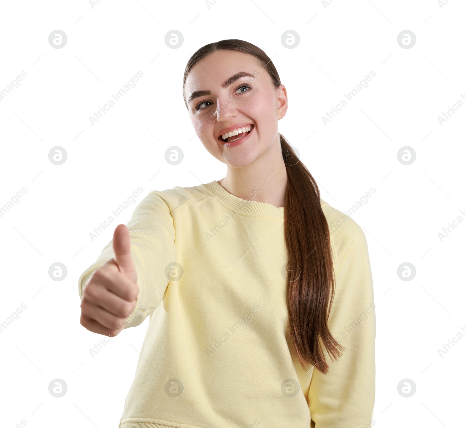 Photo of Happy woman showing thumbs up on white background. Like gesture