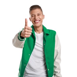 Photo of Happy man showing thumbs up on white background. Like gesture