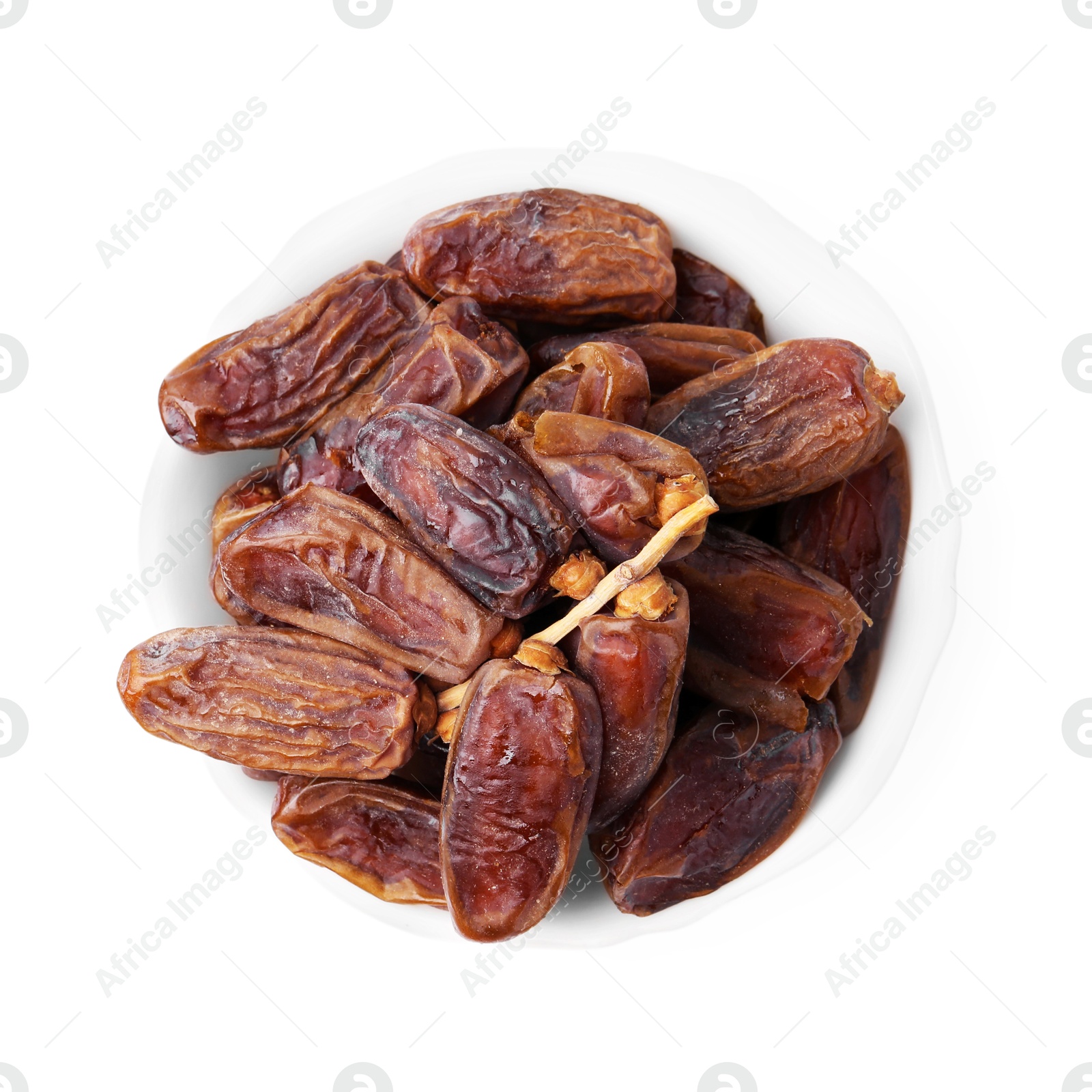 Photo of Tasty dried dates in bowl isolated on white, top view