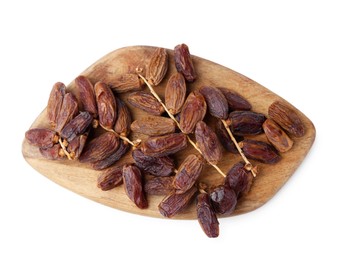 Photo of Many tasty dried dates isolated on white, top view