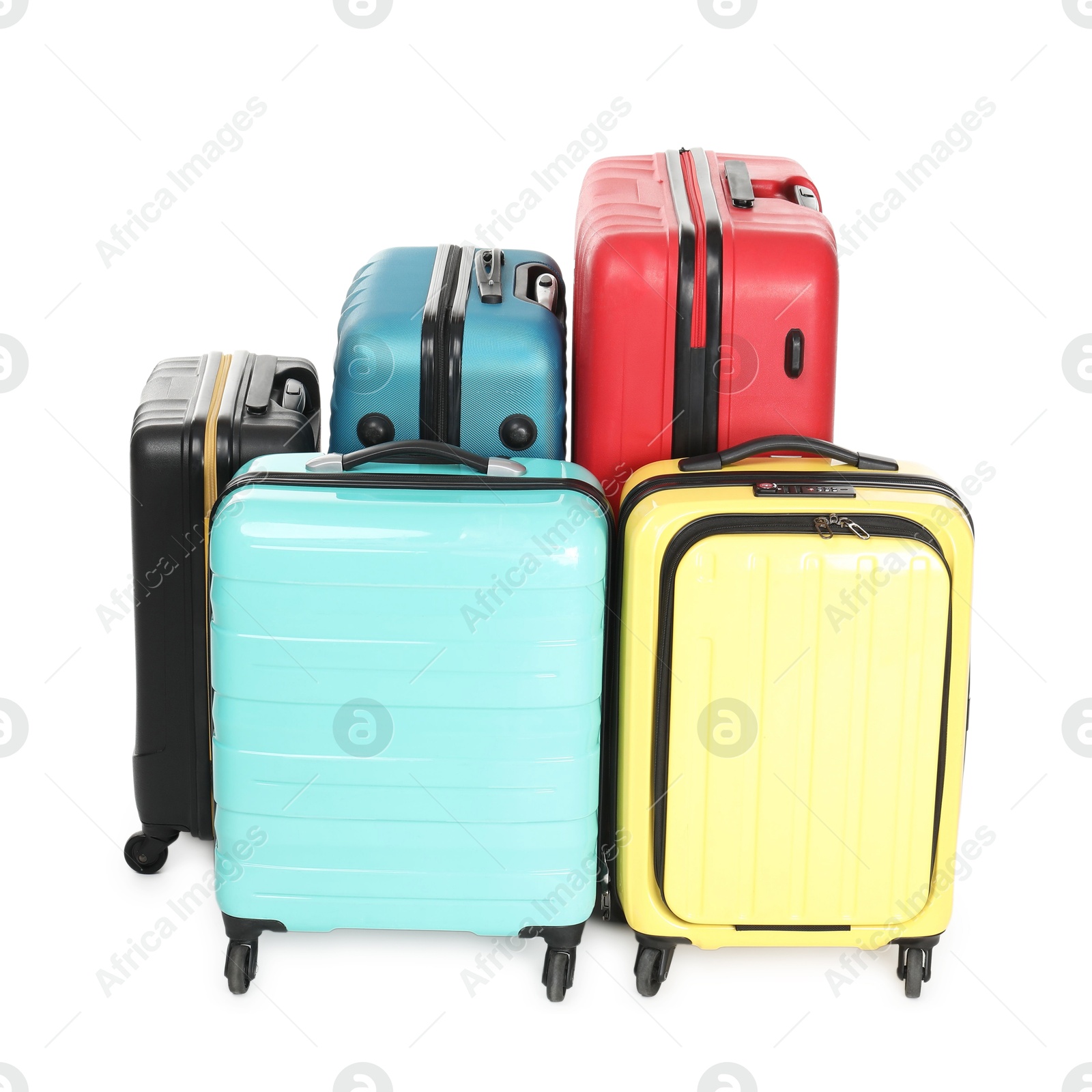 Photo of Many closed colorful suitcases isolated on white