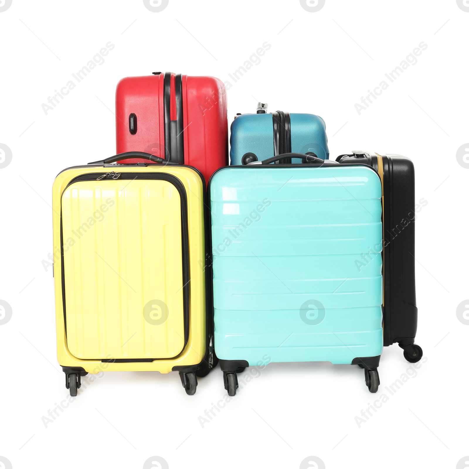 Photo of Many closed colorful suitcases isolated on white