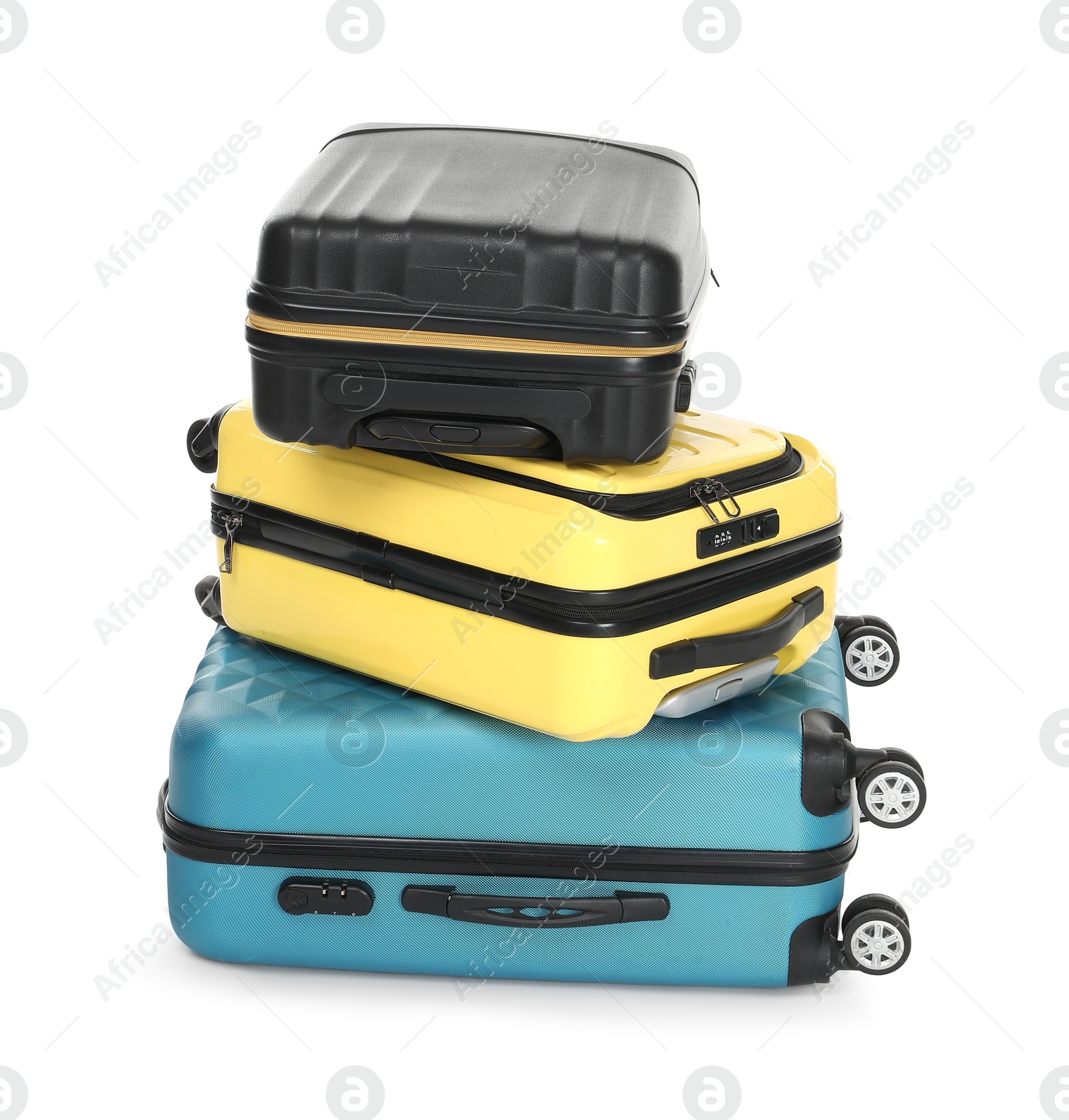 Photo of Stack of colorful suitcases isolated on white