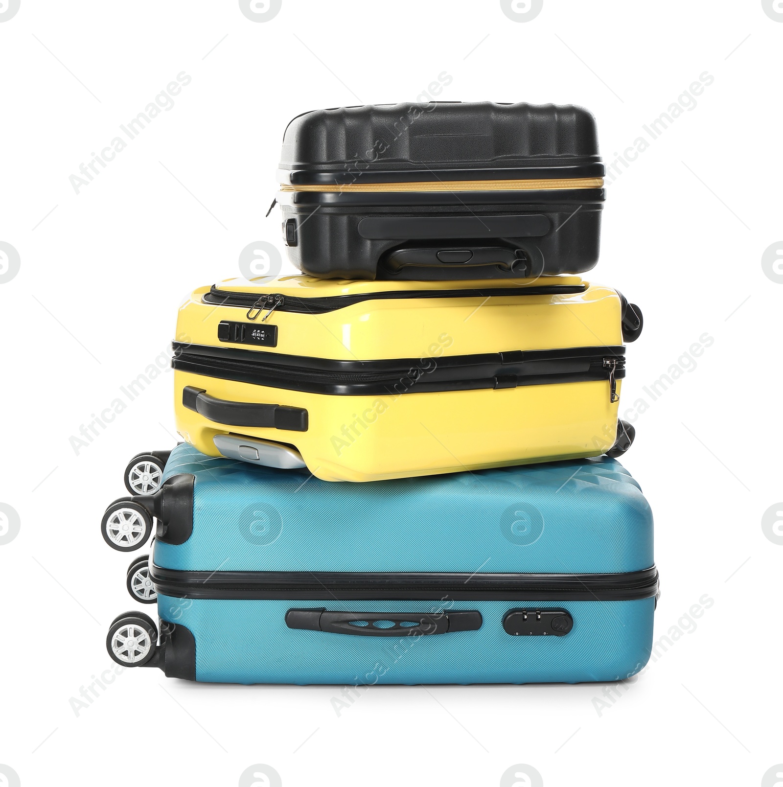 Photo of Stack of colorful suitcases isolated on white