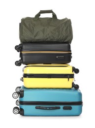 Photo of Stack of colorful suitcases and bag isolated on white