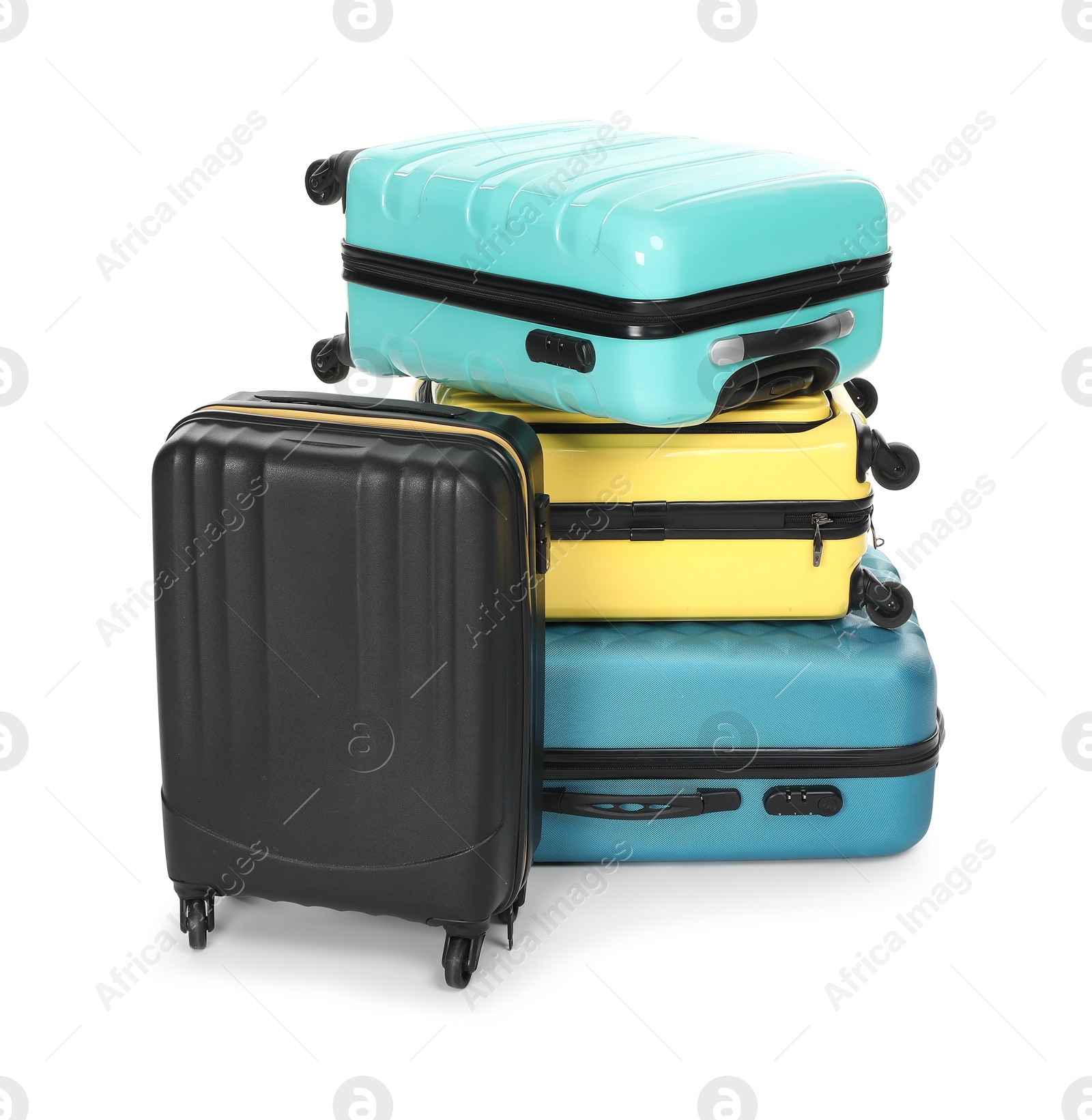 Photo of Stack of colorful suitcases isolated on white