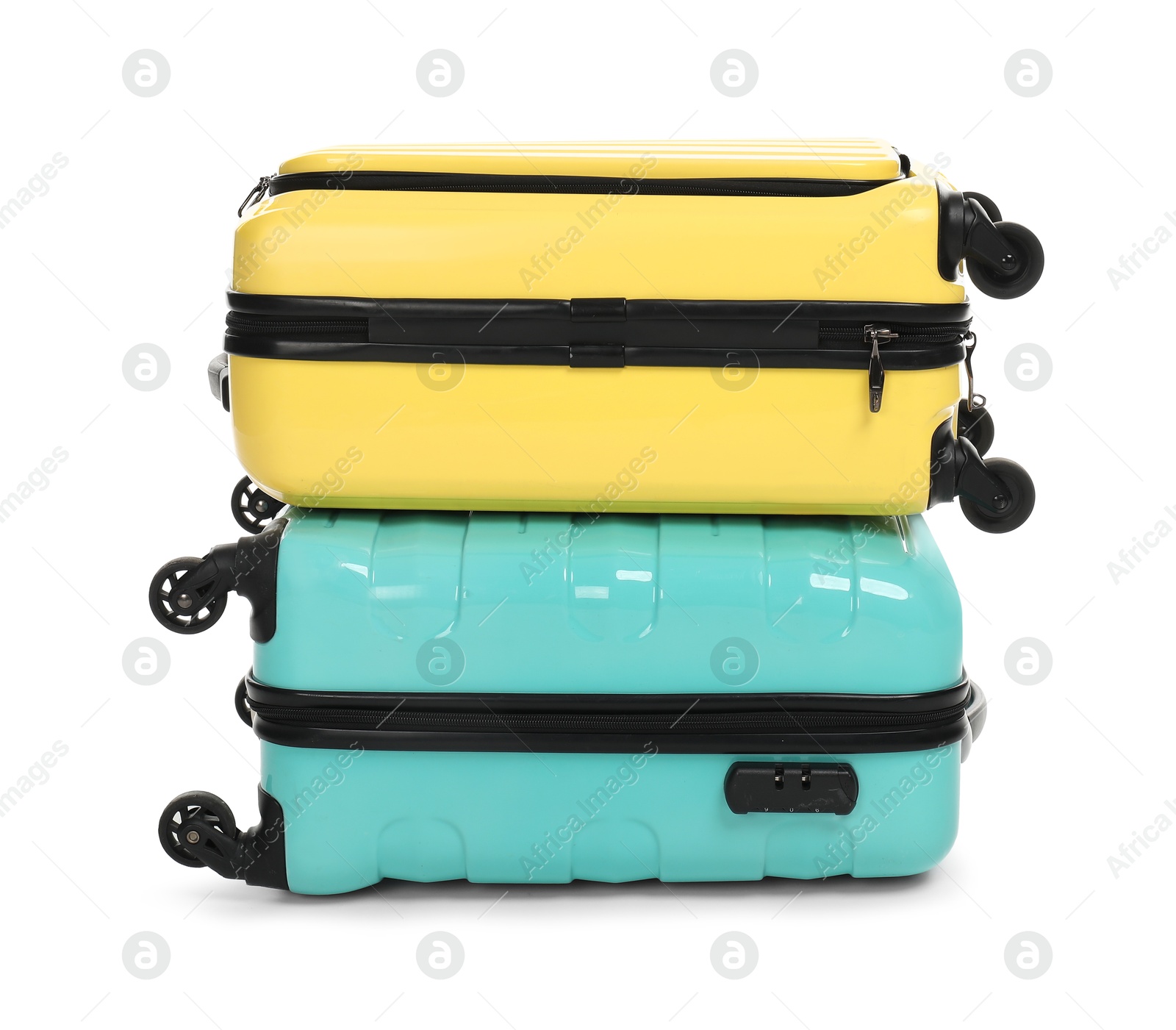 Photo of Stack of colorful suitcases isolated on white