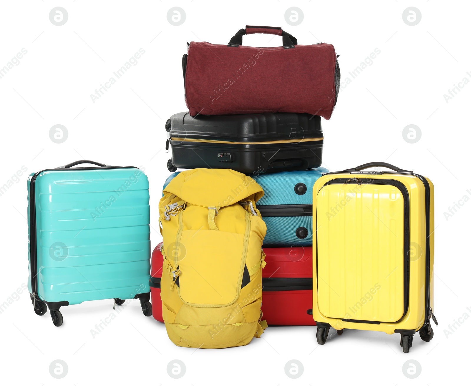 Photo of Stack of colorful suitcases, backpack and bag isolated on white