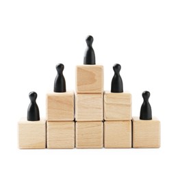 Photo of Black human figures on wooden blocks, one on top against white background. Competition concept