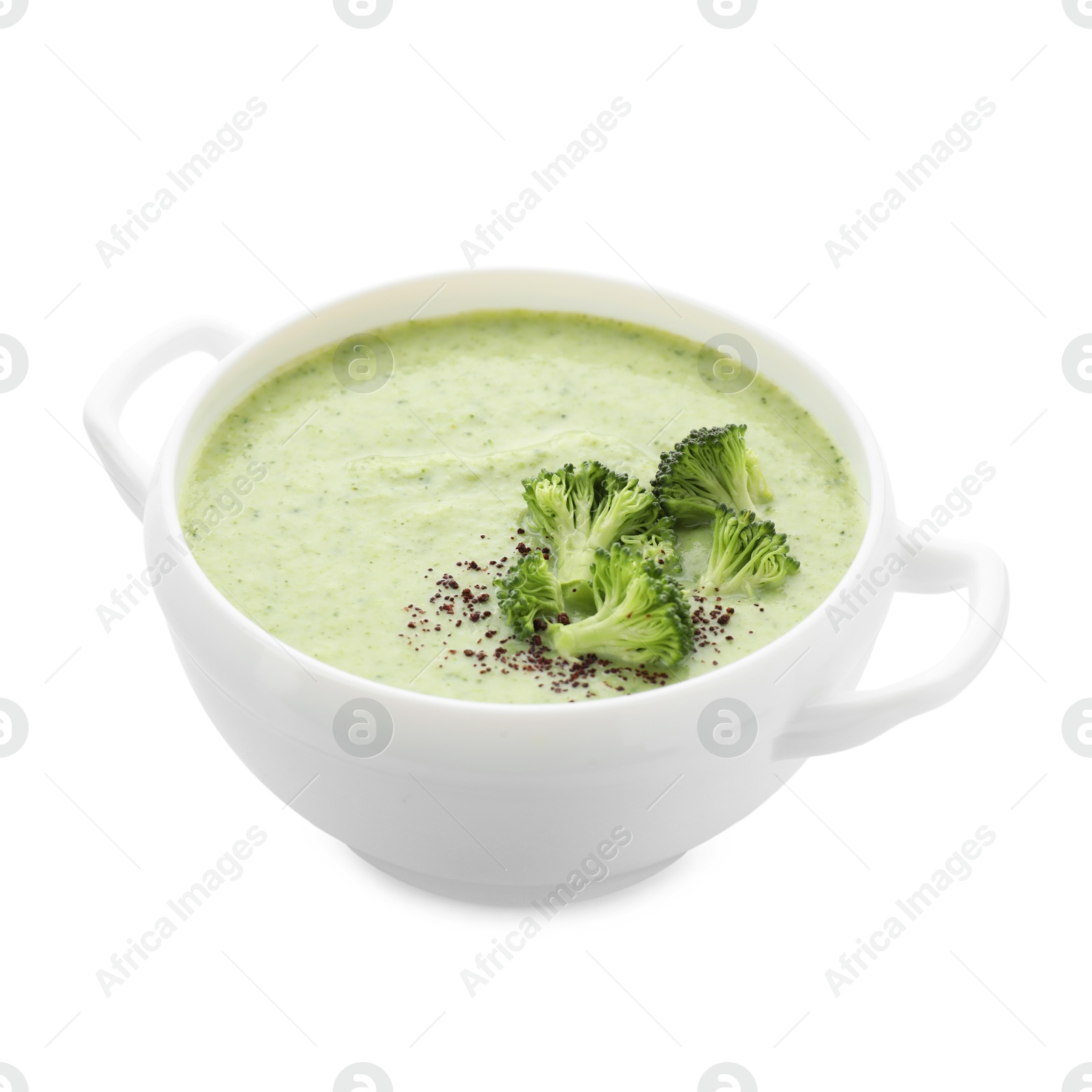 Photo of Delicious broccoli cream soup in bowl isolated on white