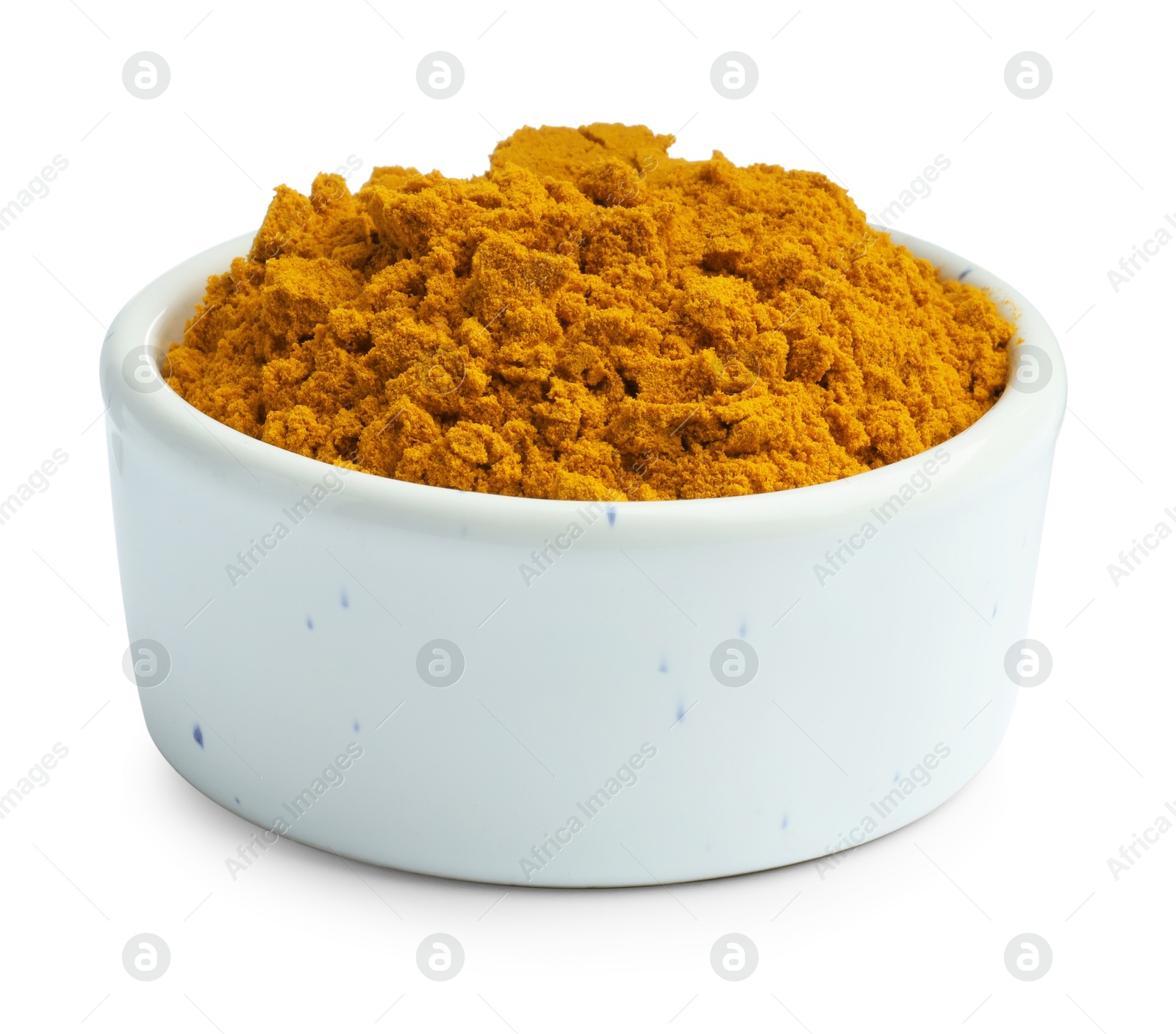 Photo of Turmeric powder in bowl isolated on white