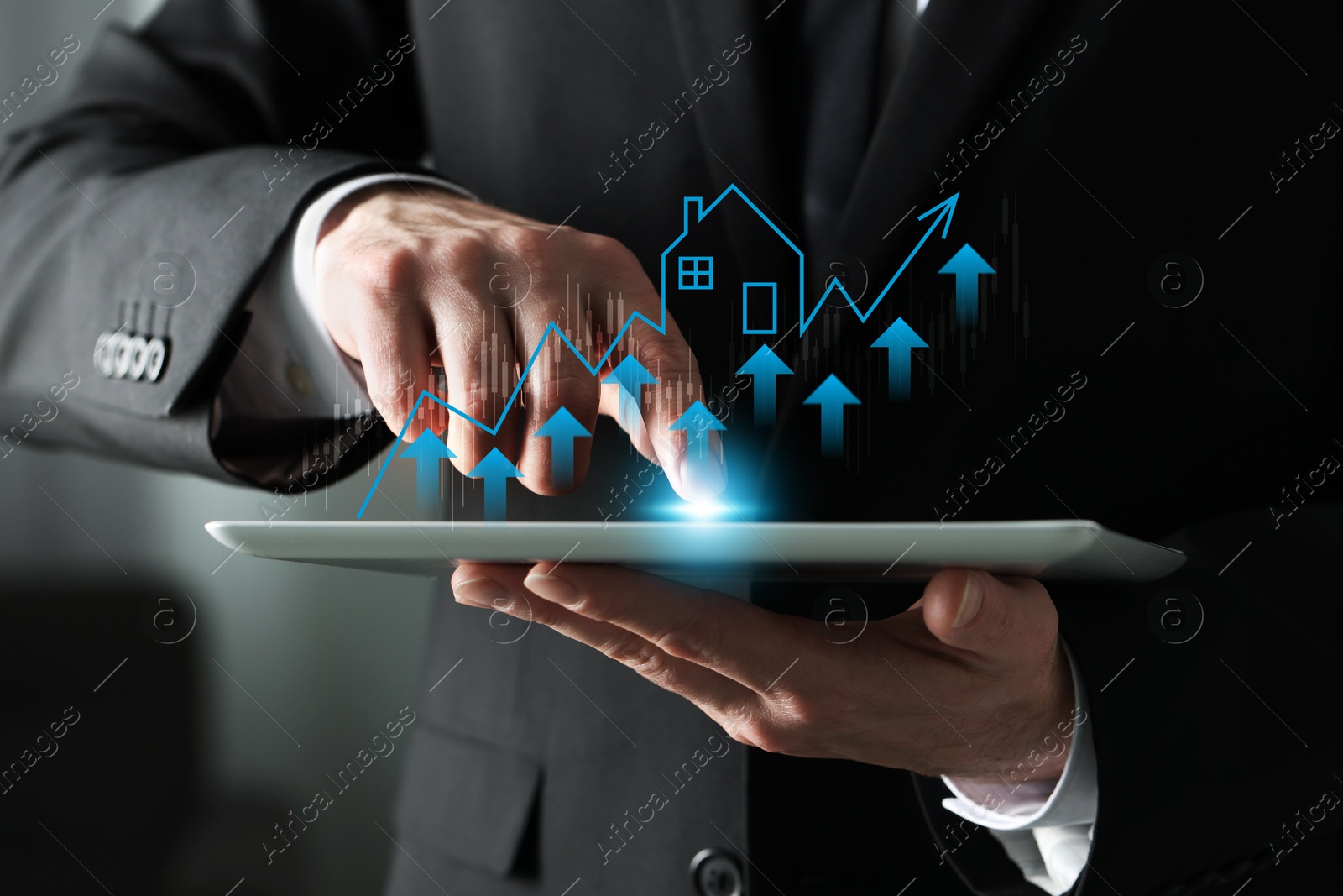 Image of Real estate market. Man using computer tablet, closeup. Graphic, arrows and illustration of house visualizing interest rate rise