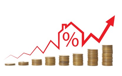 Image of Real estate market. Arrow with illustration of house and percent sign over stacked coins on white background. Interest rate rise